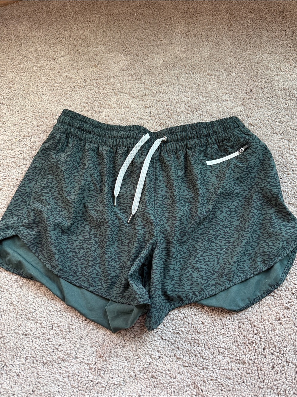 Vuori Women's Dark Green Patterned Athletic Shorts with White Drawstring 4”